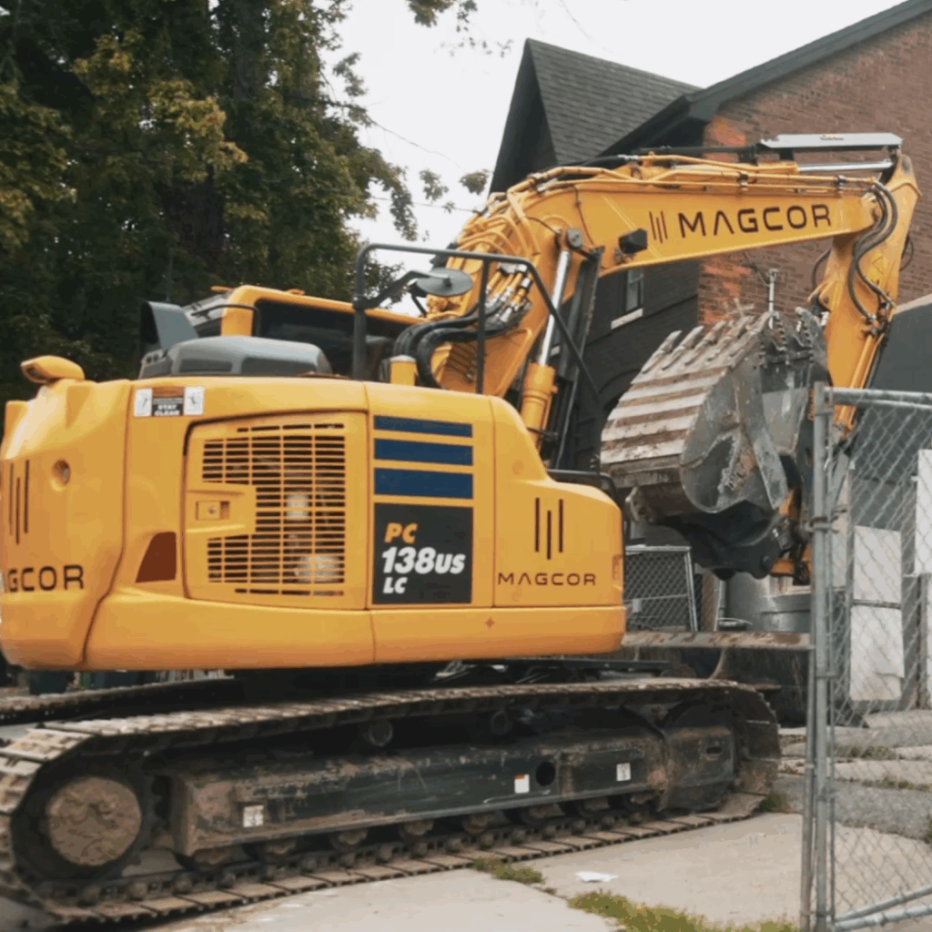 excavation contractor demolishing building