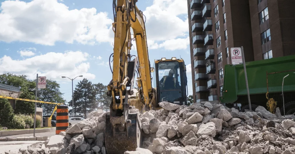 3.5 Ton excavator breaking up asphalt