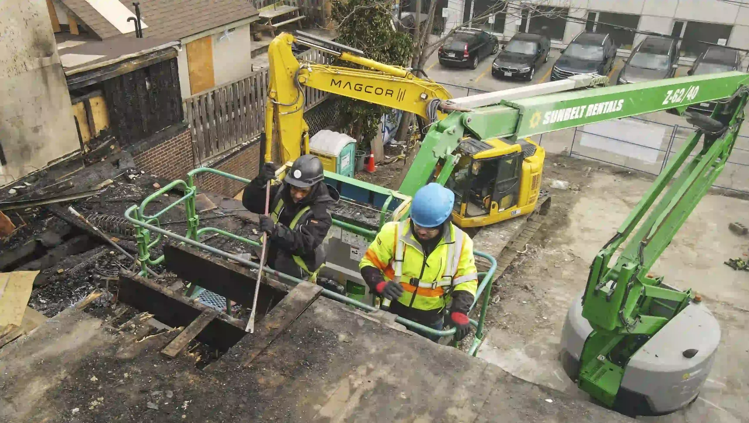 MAGCOR crew and loader carrying out careful site work in a tight Toronto space