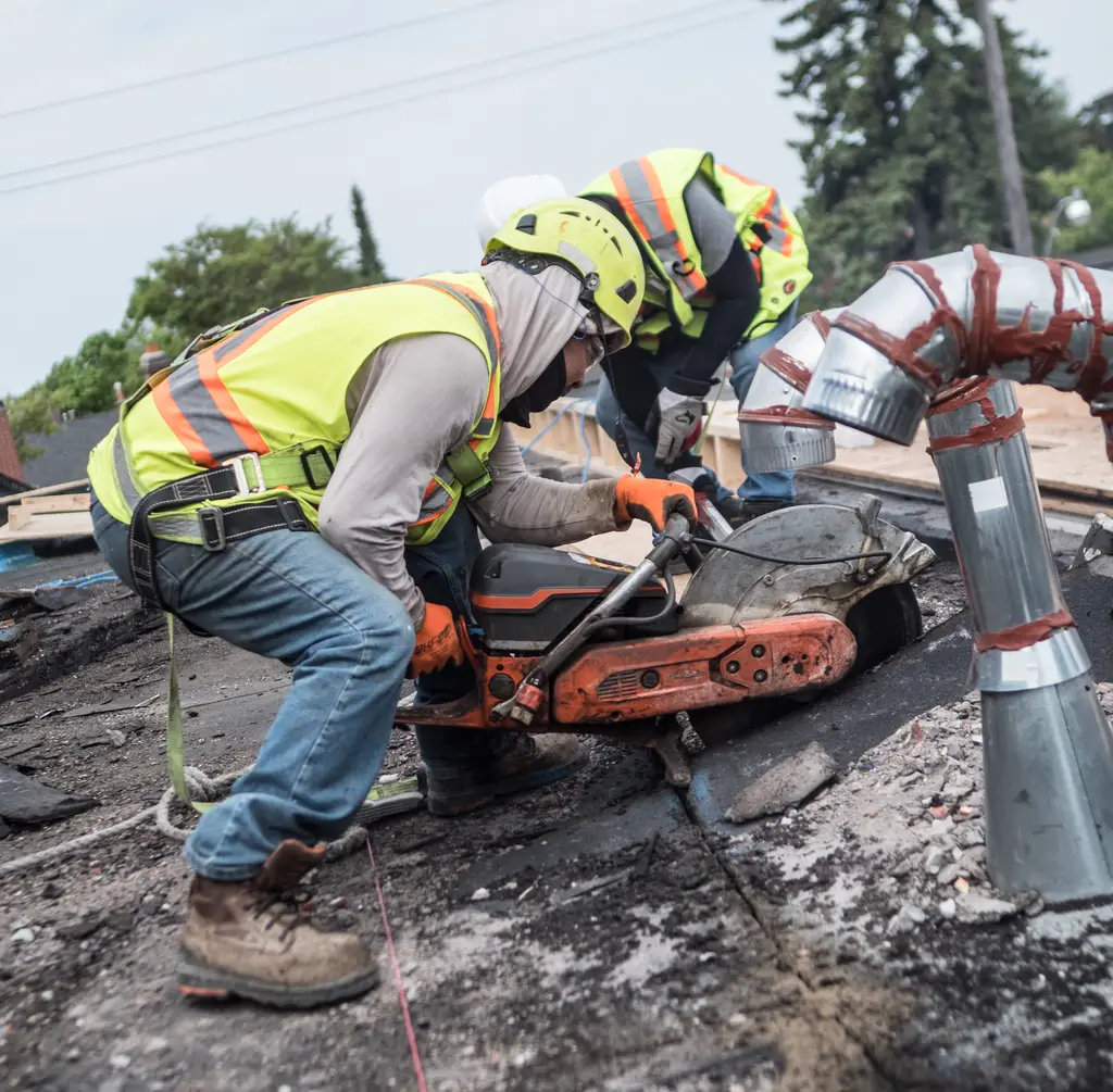 MAGCOR demolition contractors cutting material on a structure