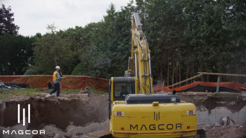 Pitman and excavator digging 